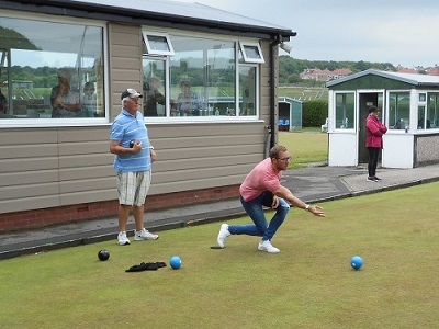 two men bowling